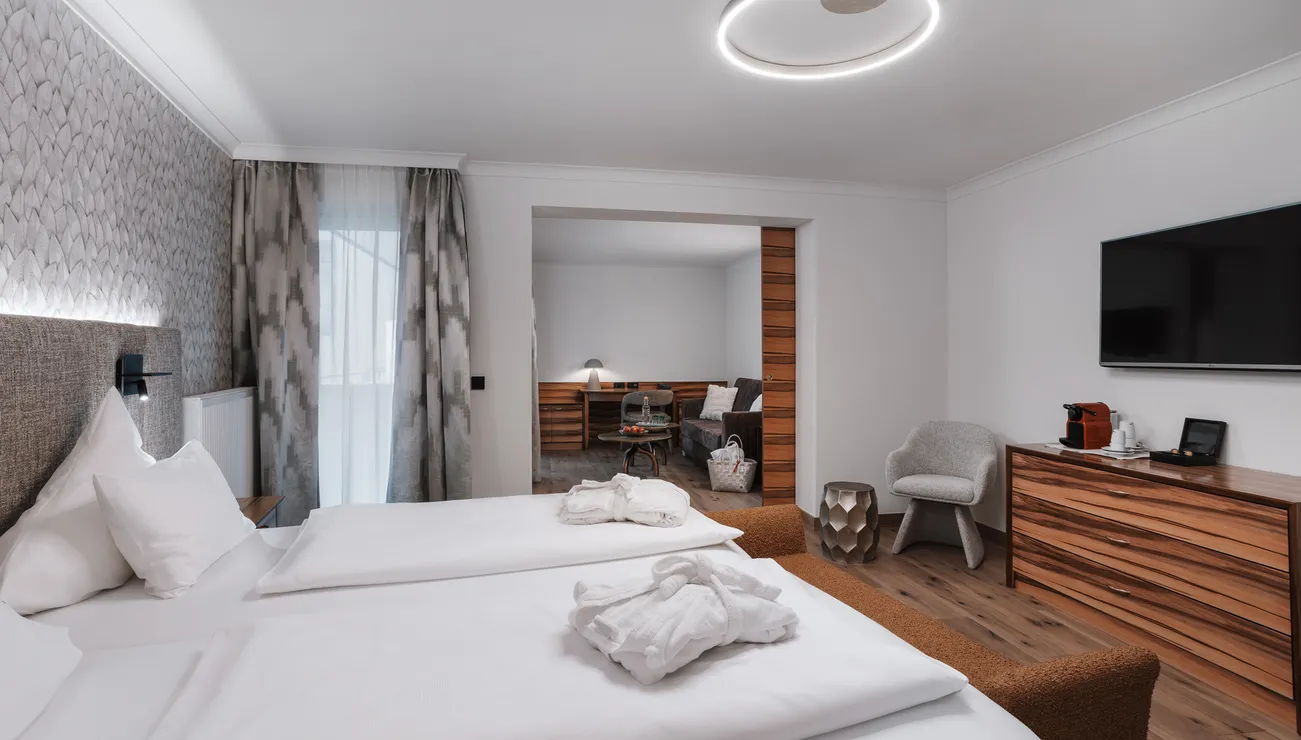 Schlafbereich in der Suite „Superior“ im Hotel das Neuhaus